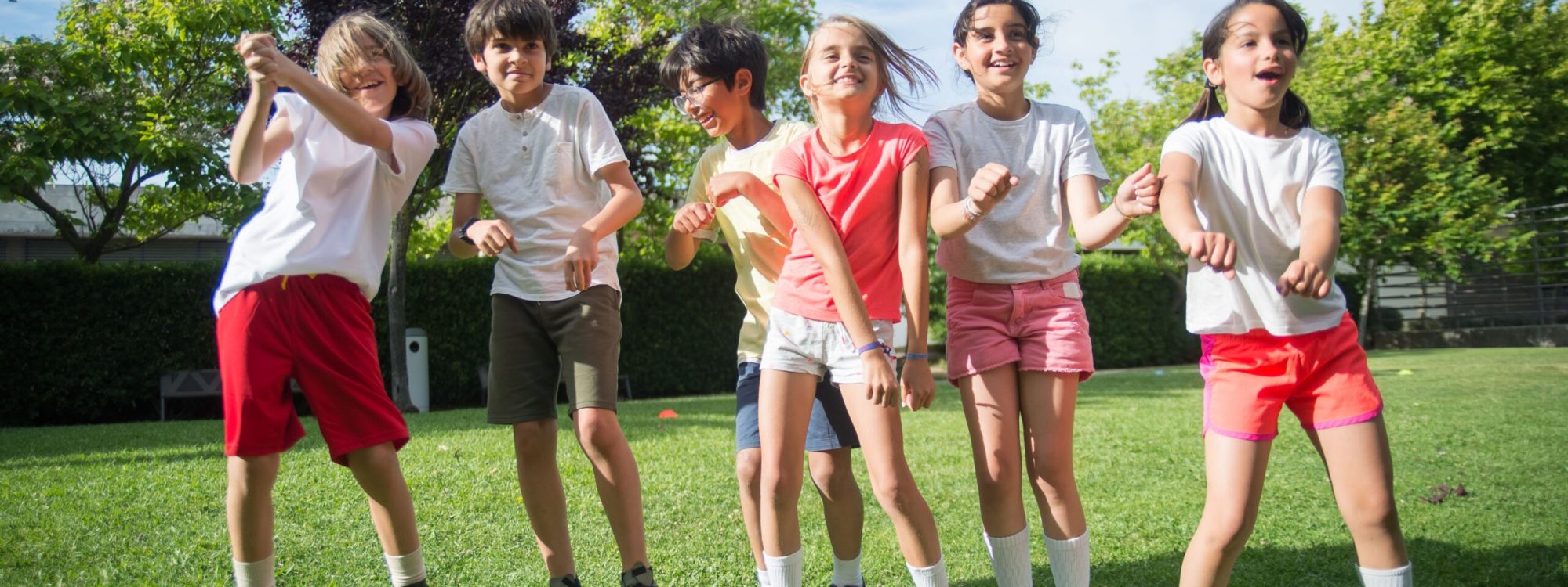 kids having fun in a grass field